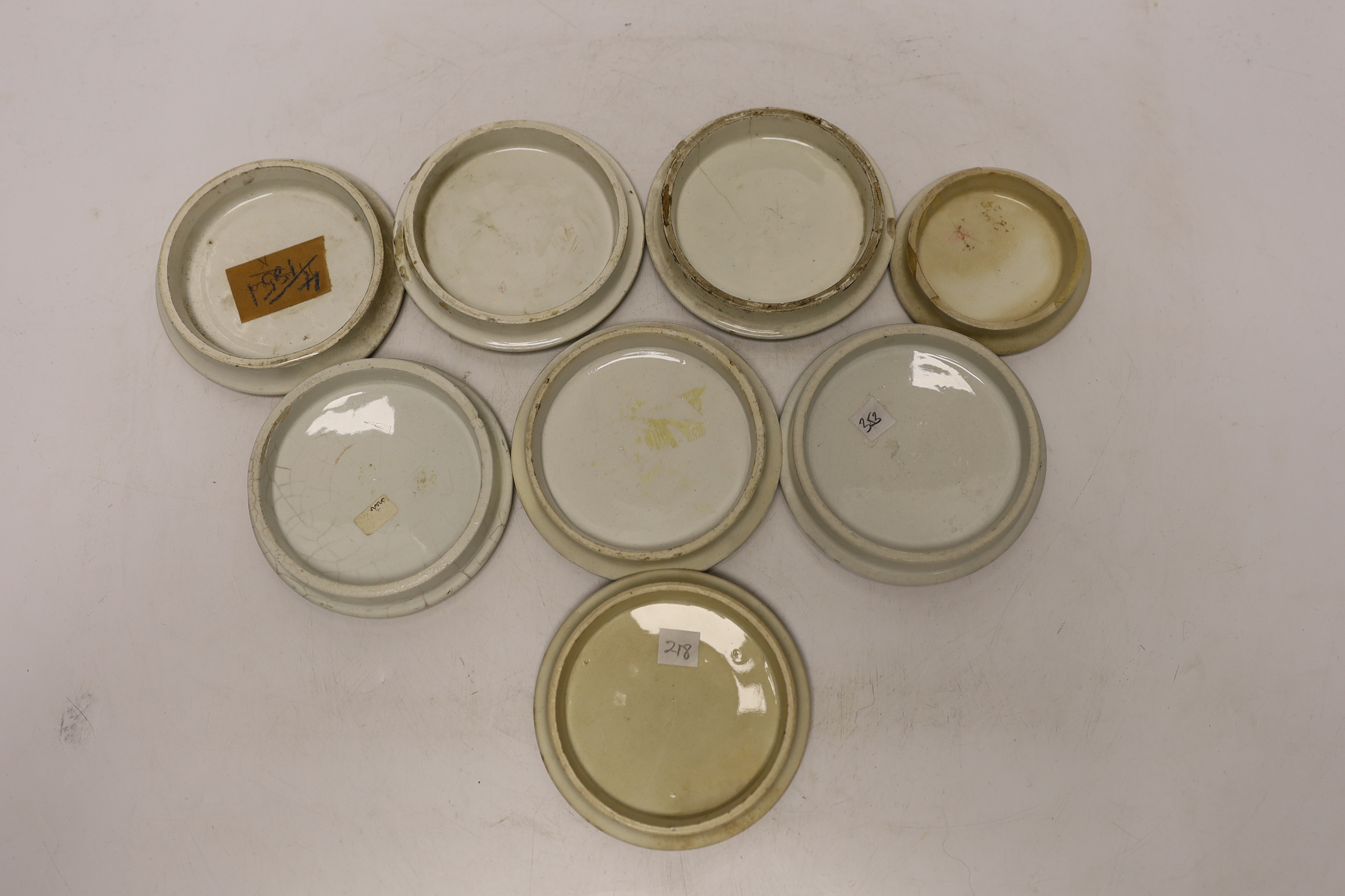 Eight Victorian ceramic Prattware pot lids